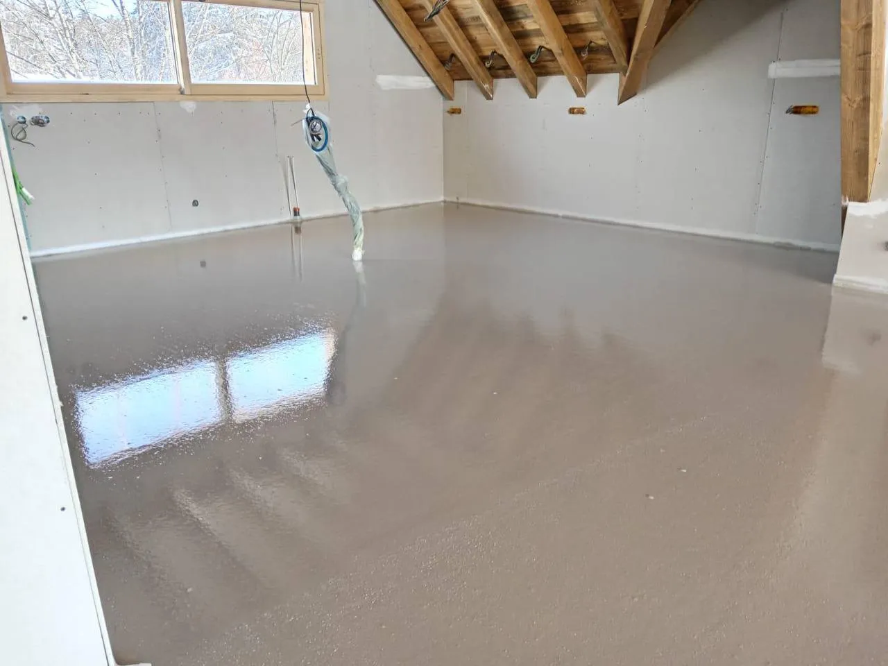 Chape liquide sous charpente traditionnelle